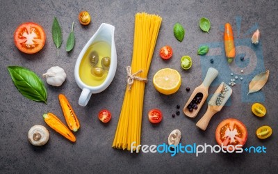 Italian Food And Menu Concept Spaghetti With Ingredients On Dark… Stock Photo
