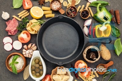 Italian Food Cooking Ingredients On Dark Stone Background With Stock Photo