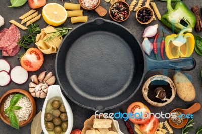 Italian Food Cooking Ingredients On Dark Stone Background With Stock Photo