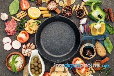 Italian Food Cooking Ingredients On Dark Stone Background With Stock Photo