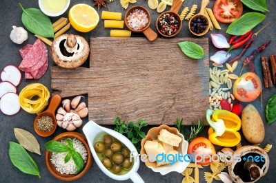 Italian Food Cooking Ingredients On Dark Stone Background With C… Stock Photo