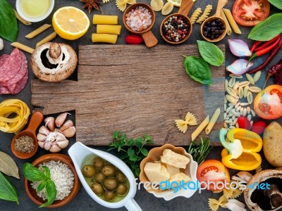 Italian Food Cooking Ingredients On Dark Stone Background With C… Stock Photo