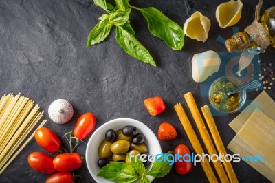 Italian Food Still Life On The Dark Table Top View Stock Photo