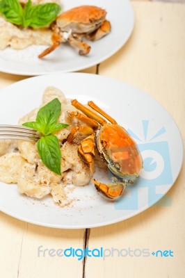 Italian Gnocchi With Seafood Sauce With Crab And Basil Stock Photo