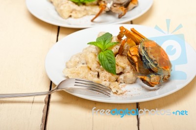 Italian Gnocchi With Seafood Sauce With Crab And Basil Stock Photo