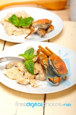 Italian Gnocchi With Seafood Sauce With Crab And Basil Stock Photo