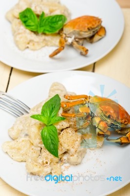 Italian Gnocchi With Seafood Sauce With Crab And Basil Stock Photo