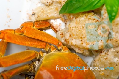 Italian Gnocchi With Seafood Sauce With Crab And Basil Stock Photo