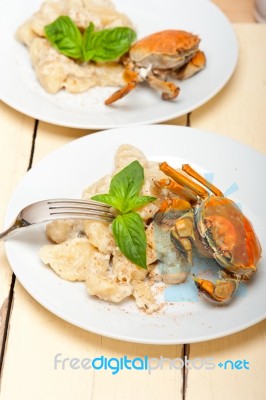 Italian Gnocchi With Seafood Sauce With Crab And Basil Stock Photo