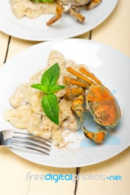 Italian Gnocchi With Seafood Sauce With Crab And Basil Stock Photo