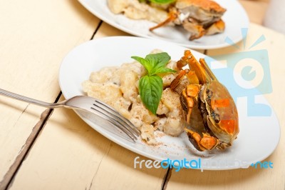 Italian Gnocchi With Seafood Sauce With Crab And Basil Stock Photo