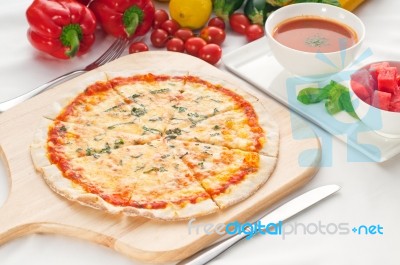 Italian Original Thin Crust Pizza Stock Photo