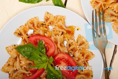 Italian Pasta Farfalle Butterfly Bow-tie And Tomato Sauce Stock Photo