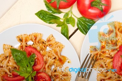 Italian Pasta Farfalle Butterfly Bow-tie And Tomato Sauce Stock Photo