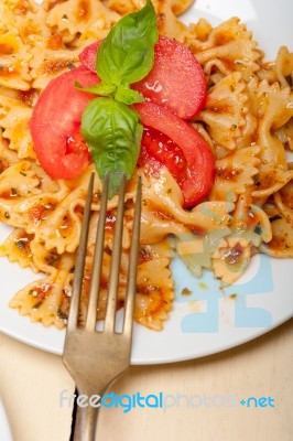 Italian Pasta Farfalle Butterfly Bow-tie And Tomato Sauce Stock Photo