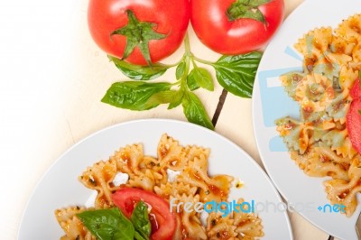 Italian Pasta Farfalle Butterfly Bow-tie And Tomato Sauce Stock Photo