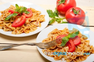 Italian Pasta Farfalle Butterfly Bow-tie And Tomato Sauce Stock Photo