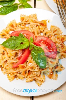 Italian Pasta Farfalle Butterfly Bow-tie And Tomato Sauce Stock Photo