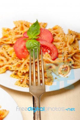 Italian Pasta Farfalle Butterfly Bow-tie And Tomato Sauce Stock Photo