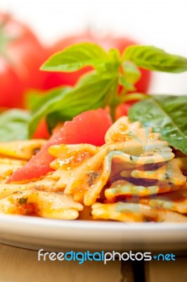 Italian Pasta Farfalle Butterfly Bow-tie And Tomato Sauce Stock Photo