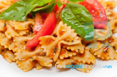 Italian Pasta Farfalle Butterfly Bow-tie And Tomato Sauce Stock Photo