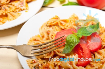 Italian Pasta Farfalle Butterfly Bow-tie And Tomato Sauce Stock Photo