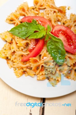 Italian Pasta Farfalle Butterfly Bow-tie And Tomato Sauce Stock Photo