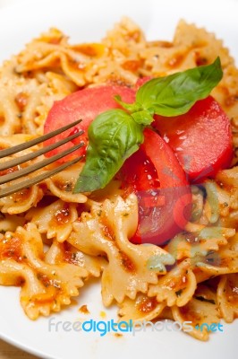 Italian Pasta Farfalle Butterfly Bow-tie And Tomato Sauce Stock Photo