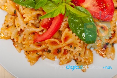 Italian Pasta Farfalle Butterfly Bow-tie And Tomato Sauce Stock Photo