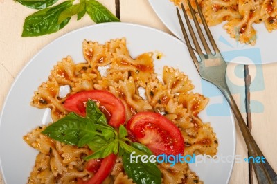 Italian Pasta Farfalle Butterfly Bow-tie And Tomato Sauce Stock Photo