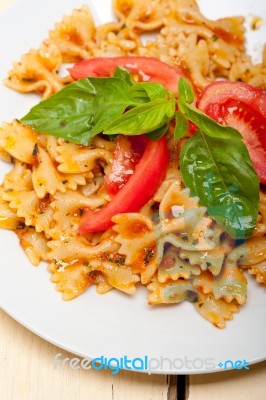 Italian Pasta Farfalle Butterfly Bow-tie And Tomato Sauce Stock Photo