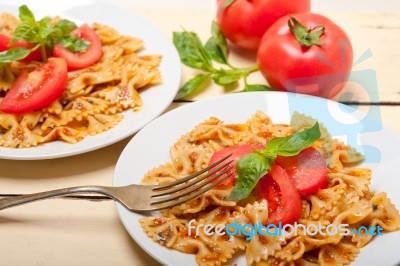 Italian Pasta Farfalle Butterfly Bow-tie And Tomato Sauce Stock Photo