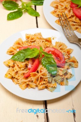 Italian Pasta Farfalle Butterfly Bow-tie And Tomato Sauce Stock Photo