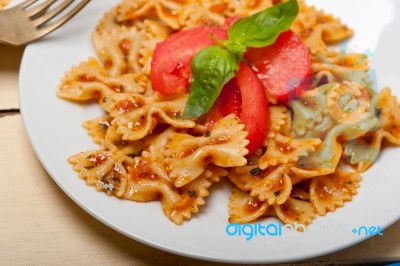 Italian Pasta Farfalle Butterfly Bow-tie And Tomato Sauce Stock Photo