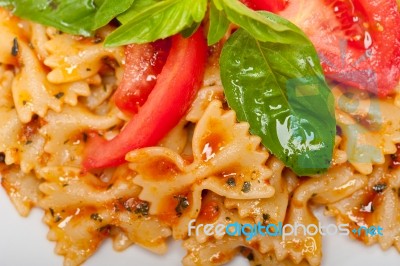 Italian Pasta Farfalle Butterfly Bow-tie And Tomato Sauce Stock Photo