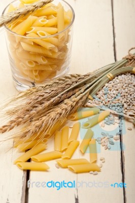 Italian Pasta Penne With Wheat Stock Photo