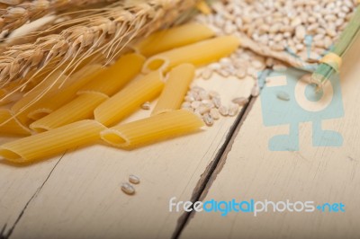 Italian Pasta Penne With Wheat Stock Photo