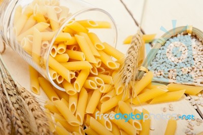 Italian Pasta Penne With Wheat Stock Photo