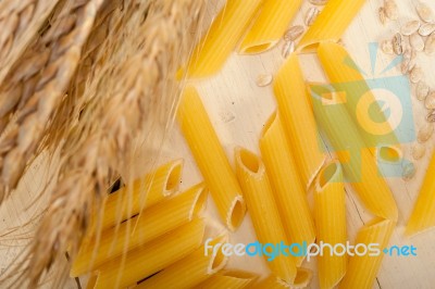 Italian Pasta Penne With Wheat Stock Photo