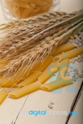 Italian Pasta Penne With Wheat Stock Photo