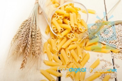 Italian Pasta Penne With Wheat Stock Photo