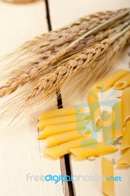 Italian Pasta Penne With Wheat Stock Photo