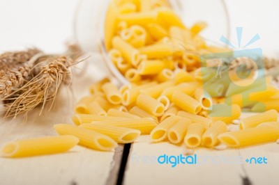 Italian Pasta Penne With Wheat Stock Photo