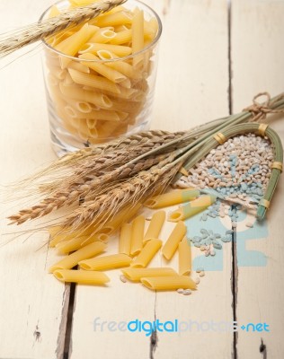 Italian Pasta Penne With Wheat Stock Photo