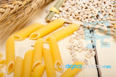 Italian Pasta Penne With Wheat Stock Photo