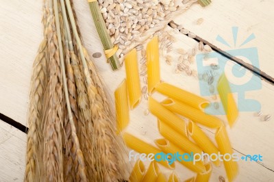 Italian Pasta Penne With Wheat Stock Photo