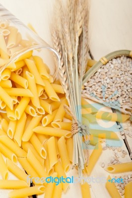 Italian Pasta Penne With Wheat Stock Photo