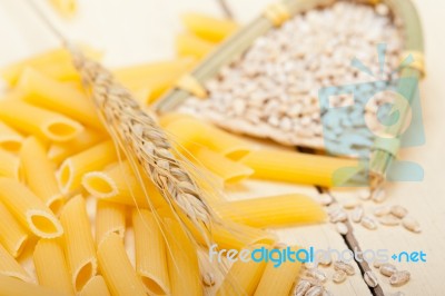 Italian Pasta Penne With Wheat Stock Photo