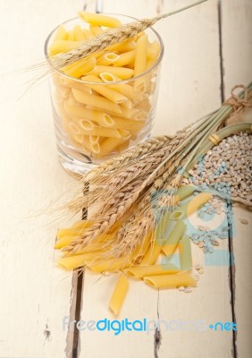 Italian Pasta Penne With Wheat Stock Photo