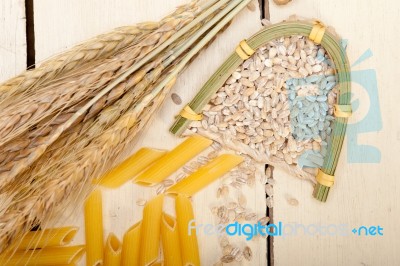 Italian Pasta Penne With Wheat Stock Photo